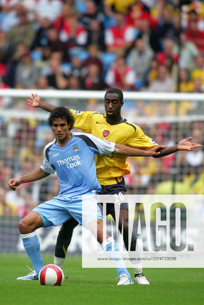 Manchester City V Arsenal, Premier League Bernardo Corradi of Manchester City and Johan Djourou of Arsenal challenge during the Premier League match between Manchester City and Arsenal at City Of Manchester Stadium on August 26, 2006 in Manchester, England. Manchester City Of Manchester Stadium England United Kingdom