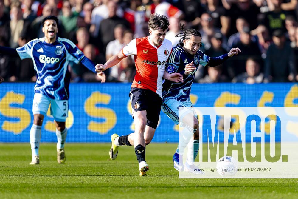 ROTTERDAM AFC Ajax Amsterdam player Kian Fitz Jim, SC Feyenoord Rotterdam player Leo Sauer during the Dutch Vriendenloterij Eredivisie match between Feyenoord and Ajax at De Kuip on March 22, 2026 in Rotterdam, the Netherlands Photo by DeFodi Images