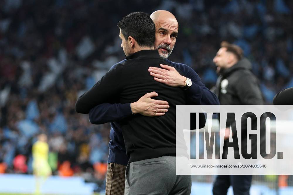 Manchester City manager Pep Guardiola and Arsenal manager Mikel Arteta embrace at full-time Arsenal v Manchester City, EFL Carabao Cup, Final, Football, Wembley Stadium, London, UK - 22 Mar 2026London Wembley Stadium United Kingdom