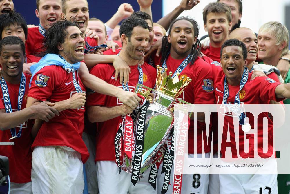 Wigan Athletic V Manchester United, ManU Premier League Carlos Tevez of Manchester United, Ryan Giggs of Manchester United, Anderson of Manchester United and Luis Nani of Manchester United celebrate with the Premier League Trophy after the Premier League match between Wigan Athletic and Manchester United at JJB Stadium on May 11, 2008 in Wigan, England. Wigan Jjb Stadium England United Kingdom