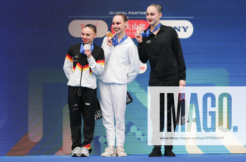 (260327) -- PARIS, March 27, 2026 -- Gold medalist Vasilina Khandoshka (C) of neutral athletes A (NAA), silver medalist Klara Bleyer (L) of Germany and bronze medalist Valeriia Plekhanova of neutral athletes B (NAB) react during the awarding ceremony after the women s solo technical final at the World Aquatics Artistic Swimming World Cup 2026 - Stop 2 in Paris, March 27, 2026. ) (SP)FRANCE-PARIS-ARTISTIC SWIMMING-WORLD AQUATICS-WORLD CUP WuxHuiwo