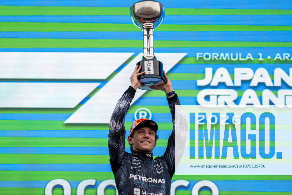 29th March 2026; Suzuka Circuit, Suzuka, Japan; 2026 FIA Formula 1 Japanese Grand Prix Race Day; Kimi Antonelli (12) of Italy and Mercedes-AMG PETRONAS Formula One Team winning the Japanese Grand Prix 2026 lifting the Japanese Grand Prix Champions trophy KeiichixMiyashita