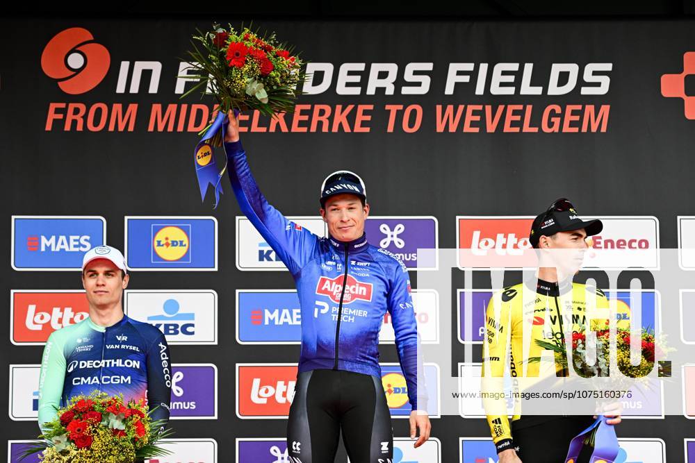 In Flanders Fields From Middelkerke to Wevelgem 2026 Cycling Race WEVELGEM, BELGIUM - MARCH 29 : Andresen Tobias Lund (DEN) of Decathlon CMA CGM Team, Laporte Christophe (FRA) of Team Visma Lease a Bike, Philipsen Jasper (BEL) of Alpecin Premier Tech on the podium during the 88th edition of In Flanders Fields From Middelkerke to Wevelgem an UCI World Tour 1.UWT one day cycling road race for Men Elite of 240 km with start in Middelkerke and finish in Wevelgem on March 29, 2026 in Wevelgem, Belgium, 29 03 2026 ( Motordriver Guy De Vuyst - Wevelgem Belgium