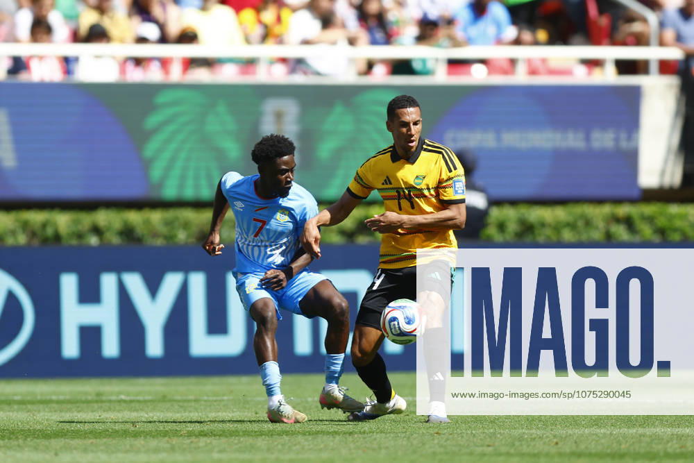 RD Congo v Jamaica - 2026 FIFA World Cup, WM, Weltmeisterschaft, Fussball Qualifying ZAPOPAN, MEXICO- MARCH 31: Nathanael Mbuku (L) of RD Congo fights for the ball with Isaac Hayden (R) of Jamaica during a World Cup 2026 playoff qualifying football match between RD Congo and Jamaica, at the Guadalajara Stadium in Zapopan, Mexico on March 31, 2026. Stringer Anadolu Zapopan Mexico. Editorial use only. Please get in touch for any other usage.