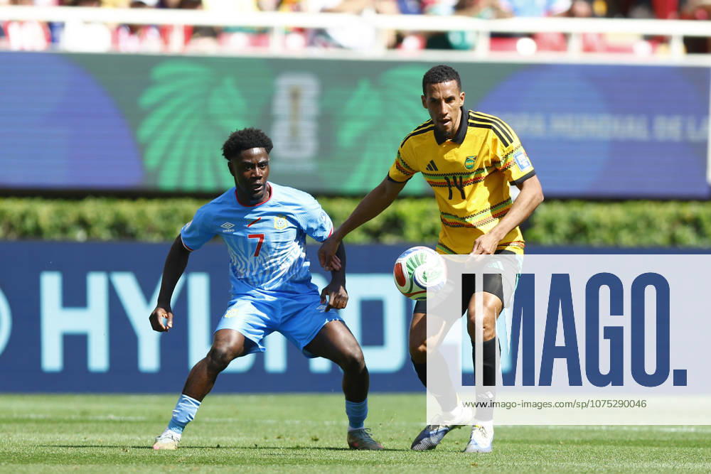 RD Congo v Jamaica - 2026 FIFA World Cup, WM, Weltmeisterschaft, Fussball Qualifying ZAPOPAN, MEXICO- MARCH 31: Nathanael Mbuku (L) of RD Congo fights for the ball with Isaac Hayden (R) of Jamaica during a World Cup 2026 playoff qualifying football match between RD Congo and Jamaica, at the Guadalajara Stadium in Zapopan, Mexico on March 31, 2026. Stringer Anadolu Zapopan Mexico. Editorial use only. Please get in touch for any other usage.