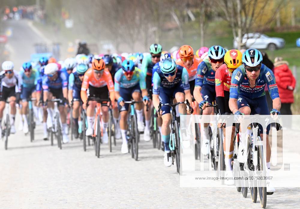 The pack of riders pictured in action during the men elite race of the Dwars Door Vlaanderen cycling event, 184,6km from Roeselare to Waregem, Wednesday 01 April 2026. POOLxTOMASxSISK x169504832x