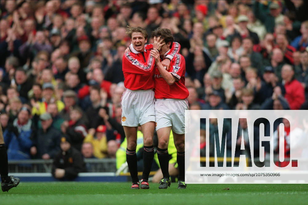 Manchester United, ManU V Everton, Premier League David Beckham of Manchester United and Gary Neville of Manchester United celebrate during the Premier League match between Manchester United and Everton at Old Trafford on March 21, 1999 in Manchester, England. Manchester Old Trafford England United Kingdom