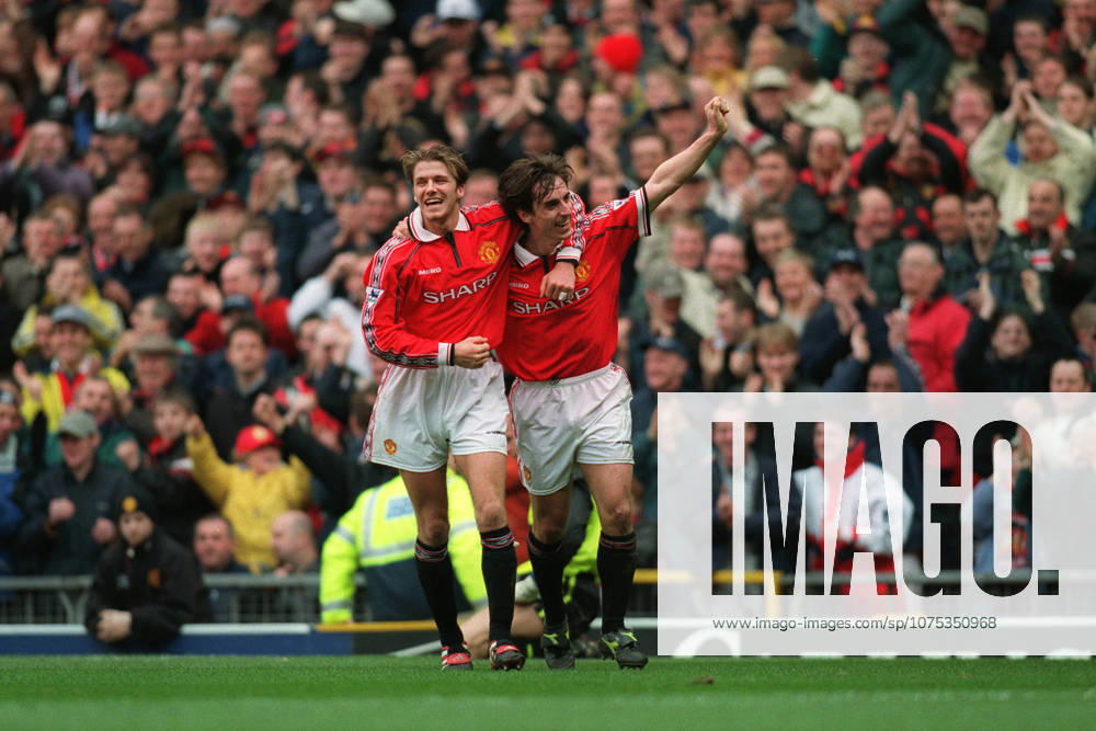 Manchester United, ManU V Everton, Premier League David Beckham of Manchester United and Gary Neville of Manchester United celebrate during the Premier League match between Manchester United and Everton at Old Trafford on March 21, 1999 in Manchester, England. Manchester Old Trafford England United Kingdom
