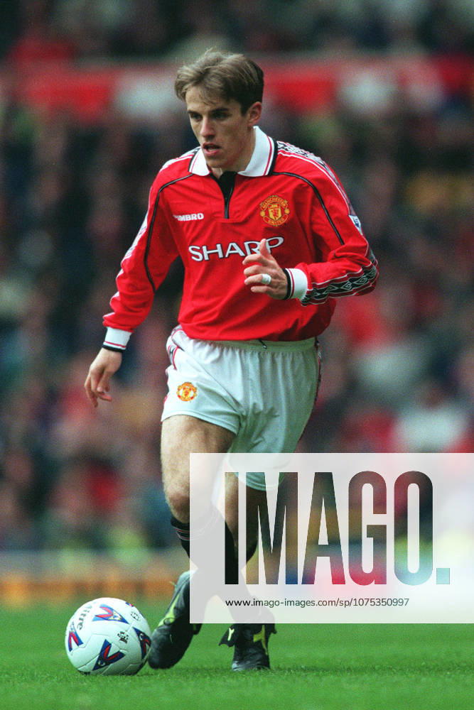 Manchester United, ManU V Everton, Premier League Philip Neville of Manchester United on the ball during the Premier League match between Manchester United and Everton at Old Trafford on March 21, 1999 in Manchester, England. Manchester Old Trafford England United Kingdom