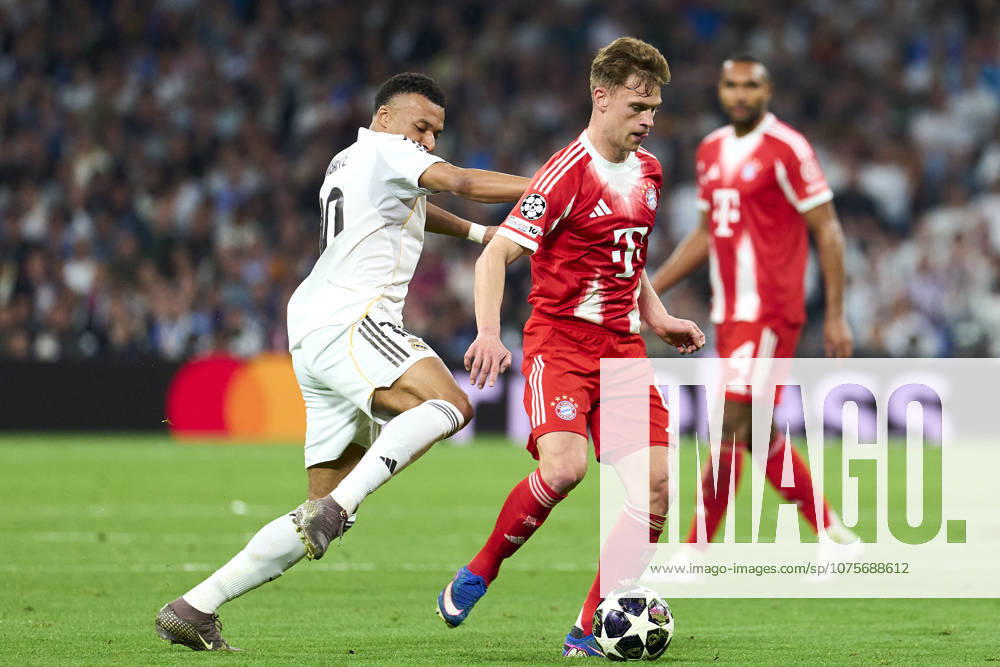 SOCCER-Matchday Round of Quarter-finals of UEFA Champions League match between Real Madrid CF and FC Bayern Munchen at Bernabeu Stadium on April 7, 2026. Joshua Kimmich of FC Bayern Munchen battles for the ball with Kylian Mbappe of Real Madrid CF during the UEFA Champions League match between Real Madrid CF and FC Bayern Munchen at Bernabeu Stadium on April 7, 2026. Madrid Madrid Spain