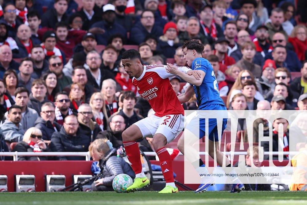 11th April 2026; Emirates Stadium, London, England; Premier League Football, Arsenal versus Bournemouth; William Saliba of Arsenal holds onto the ball under pressure from Alex Toth of Bournemouth KatiexChan