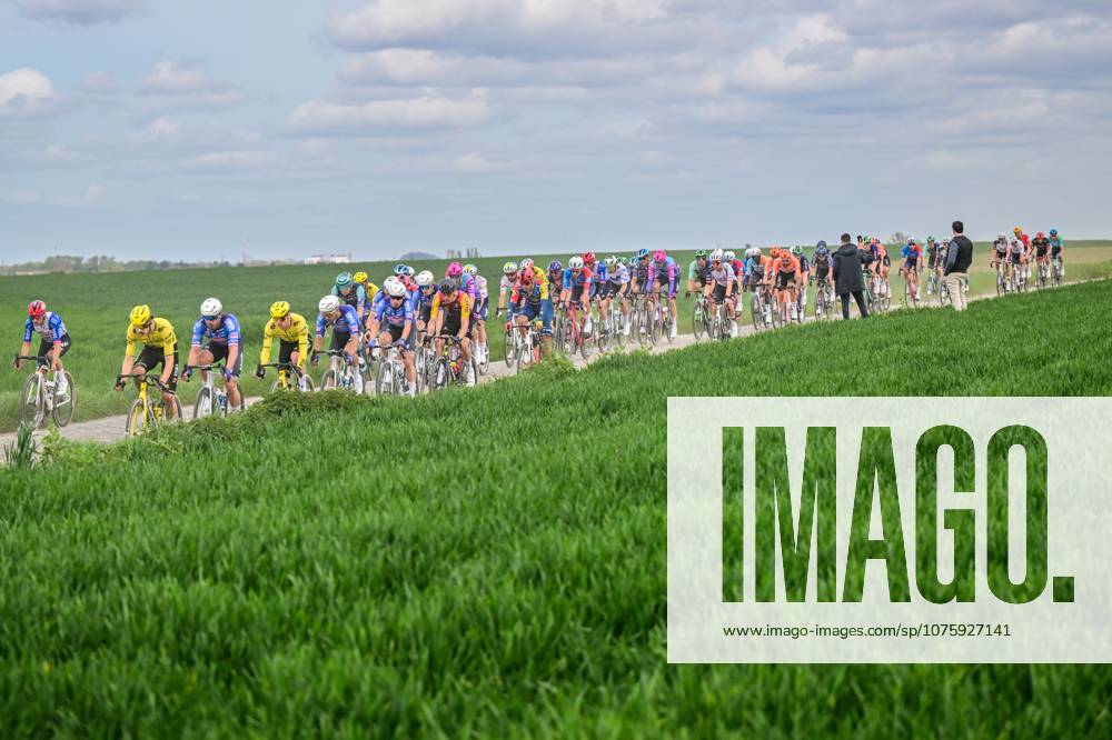 The pack of riders pictured in action during the men s Paris-Roubaix cycling race, Sunday 12 April 2026, around Roubaix, France. The 123rd edition of Paris-Roubaix cycling races will take on Sunday, with the women riding 143,1 km the men riding 258,3 km on Sunday. DIRKxWAEM x170553200x