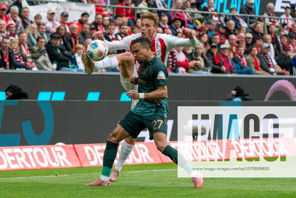 Duel between Sebastian Sebulonsen 1 FC Koeln, 28 and Felix Agu SV Werder Bremen, 27 1 FC Koeln vs SV Werder Bremen, Football, 1 Bundesliga, 29 Matchday, Season 2025 2026, 12 04 2026 DFL DFB Regulations prohibit any use of Photographs as image sequences and or Quasivideo 1, FC Koeln vs SV Werder Bremen, Football, 1 Bundesliga, 29 Matchday, Season 2025 2026, 12 04 2026 Koeln