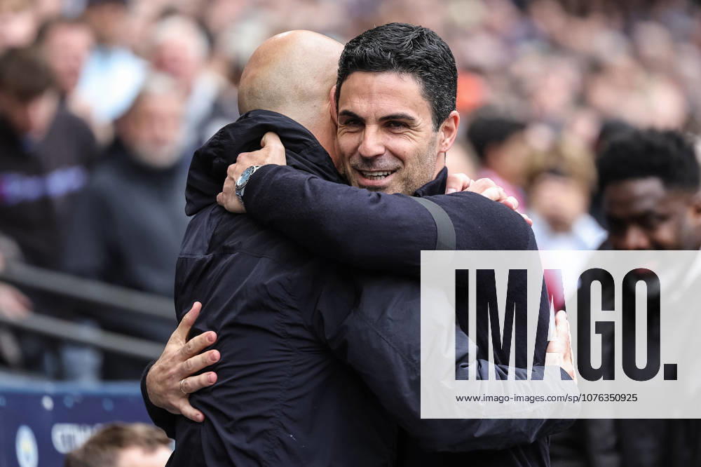 Manchester City v Arsenal - Premier League Pep Guardiola, manager of Manchester City, greets Mikel Arteta, manager of Arsenal, during the Premier League match between Manchester City and Arsenal at Etihad Stadium in Manchester, United Kingdom, on April 19, 2026. Manchester Greater Manchester United, ManU Kingdom