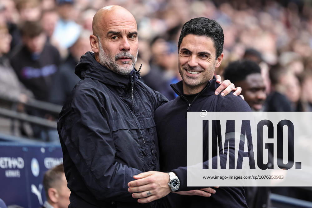 Manchester City v Arsenal - Premier League Pep Guardiola, manager of Manchester City, greets Mikel Arteta, manager of Arsenal, during the Premier League match between Manchester City and Arsenal at Etihad Stadium in Manchester, United Kingdom, on April 19, 2026. Manchester Greater Manchester United, ManU Kingdom