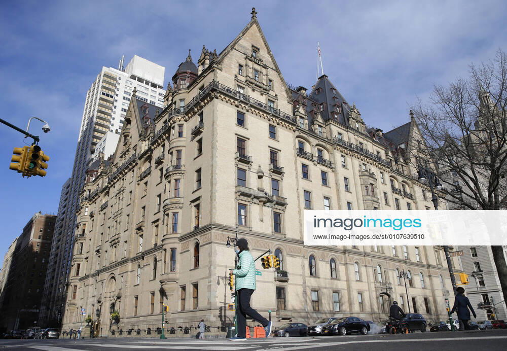 Pedestrians walk by The Dakota, the home of John Lennon, on the eve of the 40th anniversary of the night the Beatles legend was shot and killed by Mark Chapman in New York City on Monday. December 7, 2020. Strawberry Fields is a 2.5-acre landscaped section in New York City s Central Park that is dedicated to the memory of the former Beatles member. NYP20201207104 JohnxAngelillo