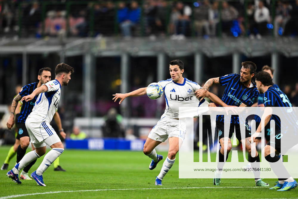 Tasos Douvikas of Como Calcio in action during the Italian Cup Semi Final second leg match between nter FC and Calcio Como on April 21, 2026 at the Giuseppe Meazza San Siro Siro stadium in Milan, Italy