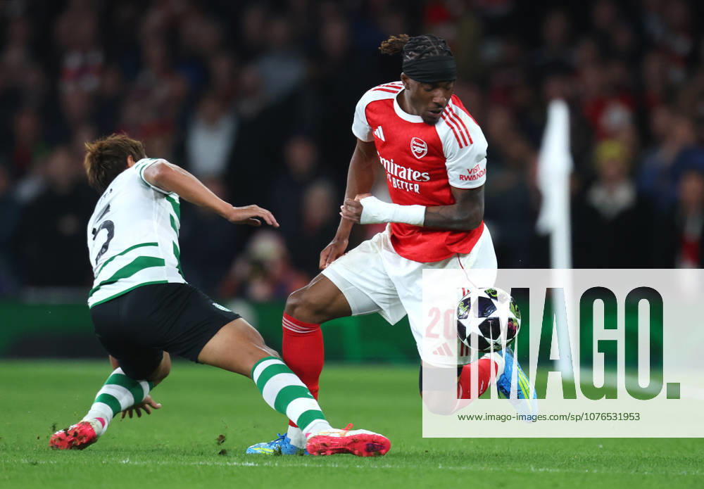 Arsenal FC v Sporting Clube de Portugal - UEFA Champions League 2025 26 Quarter-Final Second Leg Hidemasa Morita of Sporting Clube de Portugal challenge on Noni Madueke of Arsenal during the UEFA Champions League 2025 26 Quarter-Final Second Leg match between Arsenal FC and Sporting Clube de Portugal at Arsenal Stadium on April 15, 2026 in London, England. WARNING! This Photograph May Only Be Used For Newspaper And Or Magazine Editorial Purposes. May Not Be Used For Publications Involving 1 player, 1 Club Or 1 Competition Without Written Authorisation From Football DataCo Ltd. For Any Queries, Please Contact Football DataCo Ltd on +44 (0) 207 864 9121 London Arsenal Stadium England United Kingdom