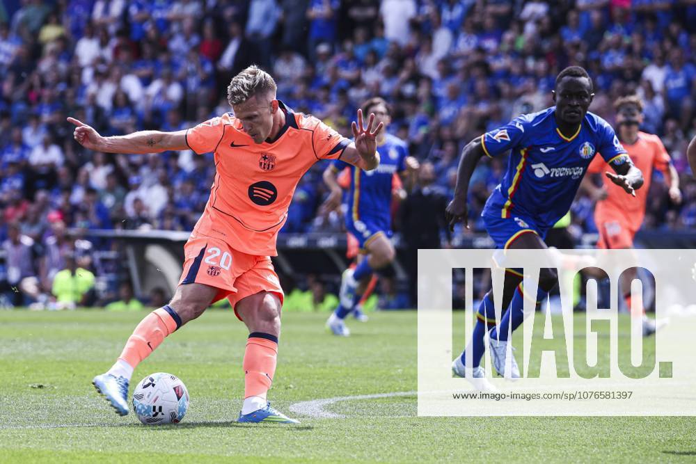 Estadio Coliseum, Madrid, Spain; La Liga Football, Getafe CF versus FC Barcelona, Barca Daniel Olmo is defended by Djene Dakonam Getafe vs FC Barcelona 900 Cordon Press 900 CordonxPress LOF - Getafe vs FC Barcelona
