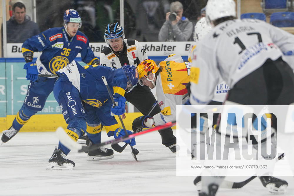 DAVOS, SWITZERLAND APRIL 18 Topscorer Henrik Borgstrom of Fribourg R against Chris Egli of Davos L at the face off during game 1 of the National League Final between HC Davos v HC Fribourg Gotteron on April 18, 2026 in Davos, Switzerland Davos zondacrypto Arena Graubunden Switzerland