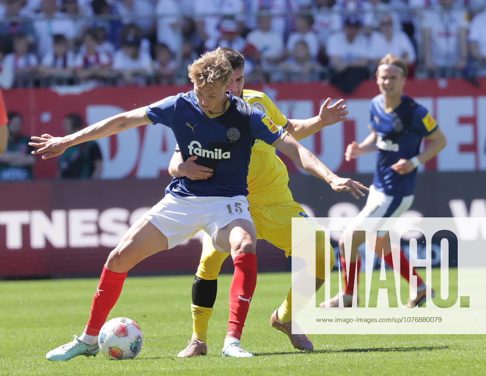 Duel between Kasper Davidsen Holstein Kiel and Mehmet Aydin Eintracht Braunschweig Football, Men, Season 2025 2026, 2 BL, Holstein Stadion, Holstein Kiel vs Eintracht Braunschweig, 2 0 DFL REGULATIONS PROHIBIT ANY USE OF PHOTOGRAPHS AS IMAGE SEQUENCES AND OR QUASI VIDEO