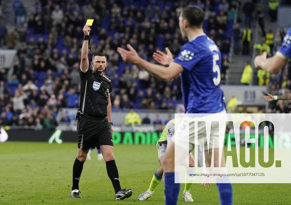 Liverpool, England, 4th May 2026. Referee Michael Oliver issues a yellow card fo Michael Keane of Everton for a tackle on Jeremy Doku of Manchester City during the Everton vs Manchester City Premier League match at Hill Dickinson Stadium, Liverpool. Picture credit should read: Andrew Yates Sportimage . SPI_023_AY_Everton_Man_City SPI-4779-0023