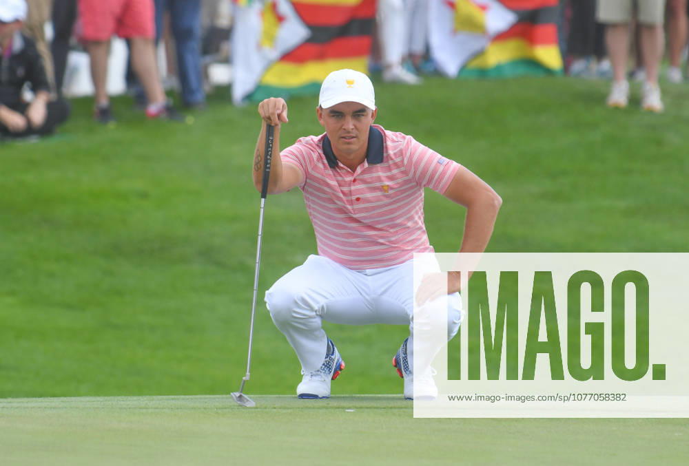 Rickie Fowler of the United States looks over a putt on the 3rd hole during the second round of the Presidents Cup at Liberty National Golf Course in Jersey City, New Jersey. Gregory Vasil CSM