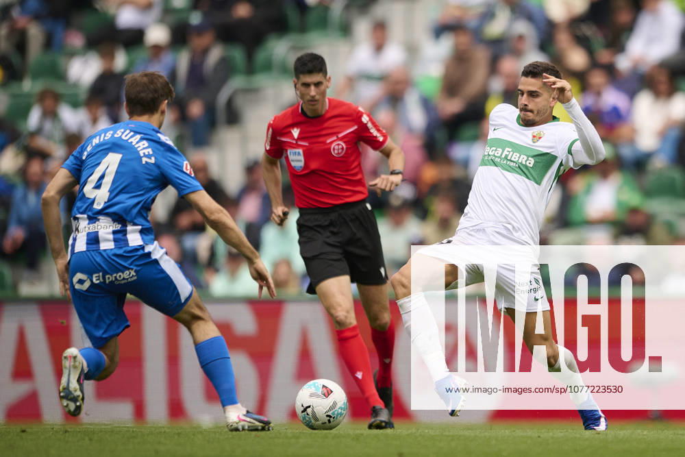 Elche CF v Deportivo Alaves - LaLiga EA Sports ELCHE, SPAIN - MAY 9: Andre Da Silva of Elche CF competes for the ball with Denis Suarez of Deportivo Alaves during to the LaLiga EA Sports match between Elche CF and Deportivo Alaves at Manuel Martinez Valero Stadium on May 9, 2026, in Elche, Spain. (Photo by Francisco Macia Photo Players Images Magara Press) Elche Martinez Valero Stadium Spain