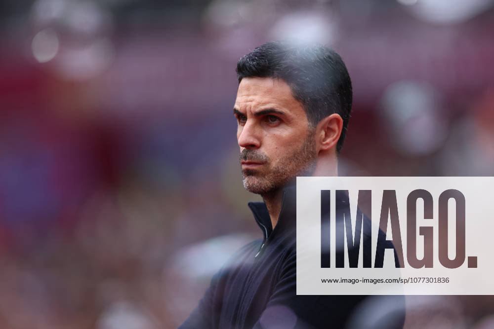 London, England, 10th May 2026. Mikel Arteta, Manager of Arsenal looks through the bubbles during the West Ham United vs Arsenal Premier League match at the London Stadium, London. Picture credit should read: Paul Terry Sportimage . SPI_010_PT_West_Ham_Arsenal SPI-4793-0010