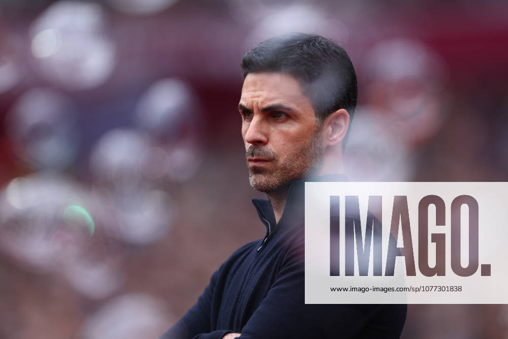 London, England, 10th May 2026. Mikel Arteta, Manager of Arsenal looks through the bubbles during the West Ham United vs Arsenal Premier League match at the London Stadium, London. Picture credit should read: Paul Terry Sportimage . SPI_011_PT_West_Ham_Arsenal SPI-4793-0011