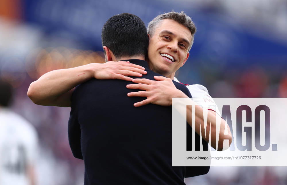 London, England, 10th May 2026. Mikel Arteta, Manager of Arsenal celebrates with Leandro Trossard of Arsenal after the West Ham United vs Arsenal Premier League match at the London Stadium, London. Picture credit should read: Paul Terry Sportimage . SPI_085_PT_West_Ham_Arsenal SPI-4793-0085