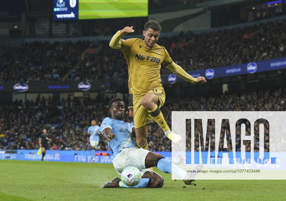 Manchester, England, 13th May 2026. Marc Guehi of Manchester City tackles Brennan Johnson of Crystal Palace during the Manchester City vs Crystal Palace Premier League match at the Etihad Stadium, Manchester. Picture credit should read: Andrew Yates Sportimage . SPI_053_AY_Man_City_Palace SPI-4799-0051