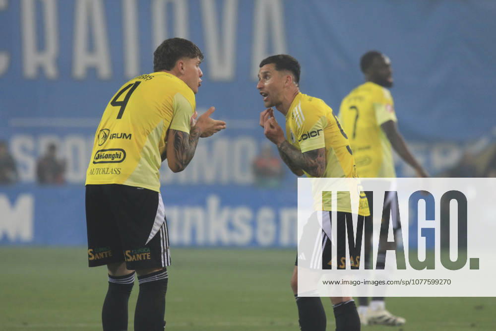 Craiova, Romania, Superliga Season 2025-2026, Play-Off, Stage 9, Universitatea Craiova vs FC Universitatea Cluj, Ion Oblemenco stadium, Craiova, Romania 94 Ovidiu Bic and 4 Andrei Coubis fight after recieving a goal
