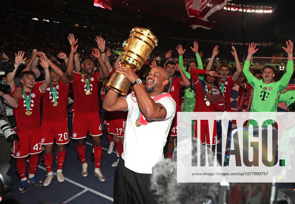 Football, Men, DFB Cup Final, Season 2025 2026, FC Bayern Munich VFB Stuttgart, Olympiastadion Berlin The FC Bayern Munich team celebrates winning the DFB Cup here after the game, in the picture Vincent Kompany, coach FC Bayern Munich with the cup while cheering in front of the fan curve DFB, DFL regulations prohibit any use of photographs as image sequences and or quasi video