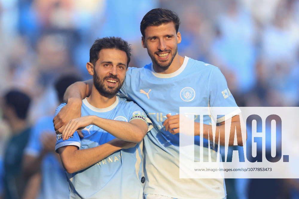 Manchester City v Aston Villa, Premier League Bernardo Silva (20) of Manchester City and Ruben Dias (3) of Manchester City during the celebrations at the end of the Premier League match between Manchester City and Aston Villa at the Etihad Stadium, Manchester, UK on 24 May 2026. Manchester Etihad Stadium Manchester UK Editorial use only DataCo restrictions apply See www.football-dataco.com ,
