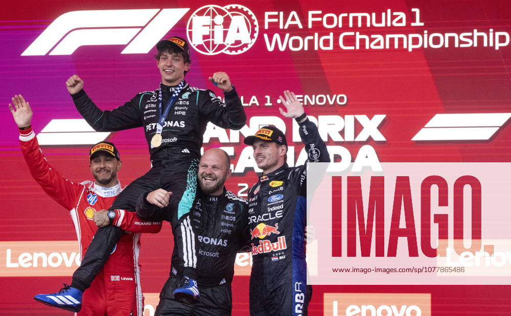 Winner Mercedes driver Kimi Antonelli of Italy is hoisted by second place Ferrari driver Lewis Hamilton of the United Kingdom, left, and Mercedes team senior composite technician Dean Hale, as third place Red Bull Racing driver Max Verstappen of the Netherlands, right, joins them following Formula One auto racing Canadian Grand Prix in Montreal on Sunday, May 24, 2026. Canada News - May 24, 2026 - ZUMAc35_ 20260524_zaf_c35_105