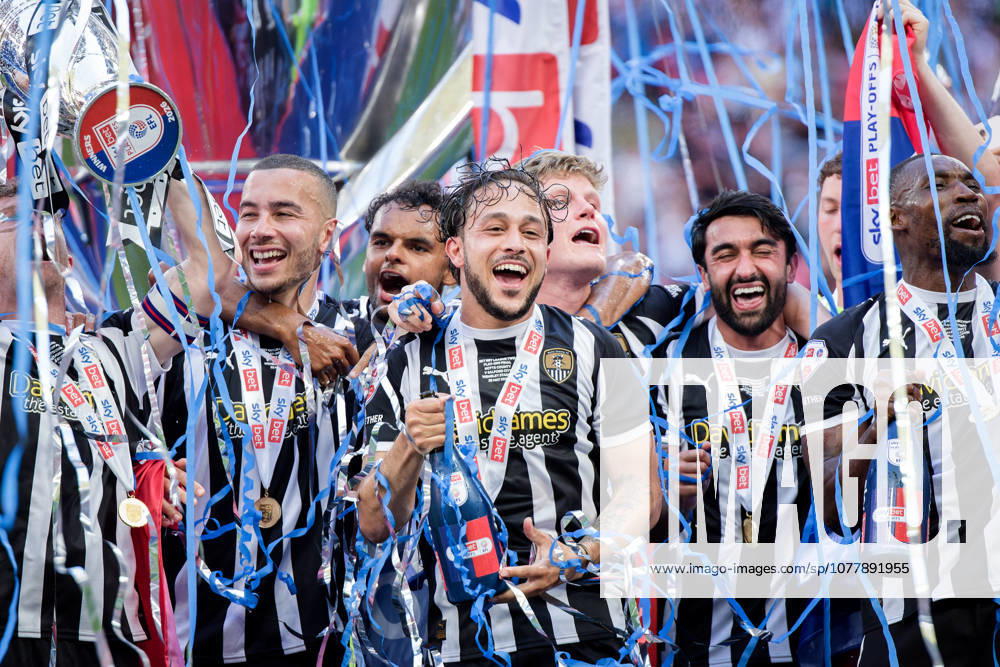 Players of Notts County celebrate with the trophy after the League Two Play-Off Final match between Notts County and Salford City at Wembley Stadium on May 25, 2026 in London, England.