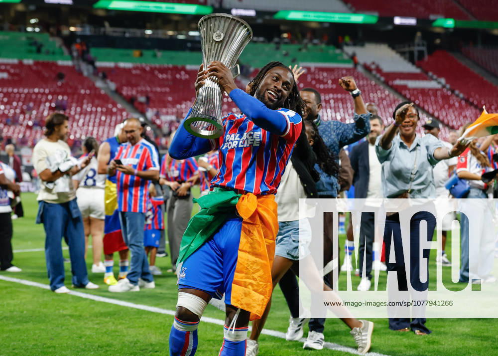 Leipzig, Germany, 27th May 2026. Evann Guessand of Crystal Palace lifts the UEFA Conference League trophy following the Crystal Palace vs Rayo Vallecano UEFA Conference League Final match at Leipzig Stadium, Leipzig. Picture credit should read: Cody Froggatt Sportimage . SPI_150_CF_CRYSTAL_PALACE_V_RAYO_VALLECANO SPI-4827-0150