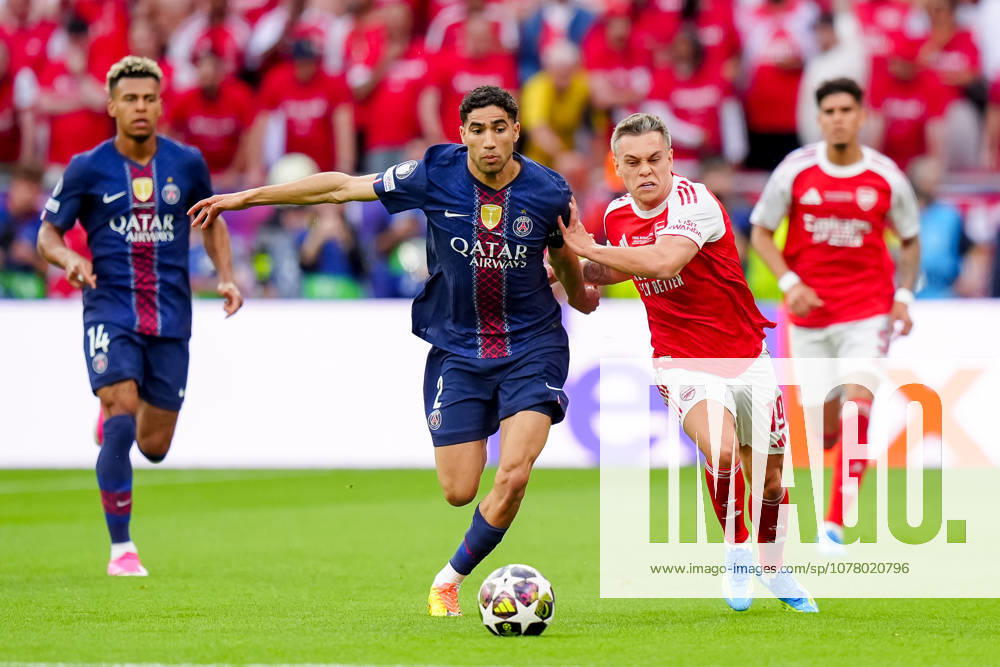 Paris Saint-Germain v Arsenal FC - UEFA Champions League Final 2026 Achraf Hakimi of Paris Saint-Germain FC competes for the ball with Leandro Trossard of Arsenal FC during the UEFA Champions League Final match between Paris Saint-Germain FC and Arsenal FC at Puskas Arena on May 30, 2026 in Budapest, Hungary Budapest Puskas Arena Hungary Hungary