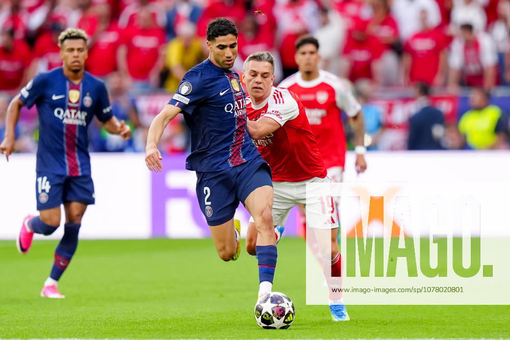 Paris Saint-Germain v Arsenal FC - UEFA Champions League Final 2026 Achraf Hakimi of Paris Saint-Germain FC competes for the ball with Leandro Trossard of Arsenal FC during the UEFA Champions League Final match between Paris Saint-Germain FC and Arsenal FC at Puskas Arena on May 30, 2026 in Budapest, Hungary Budapest Puskas Arena Hungary Hungary