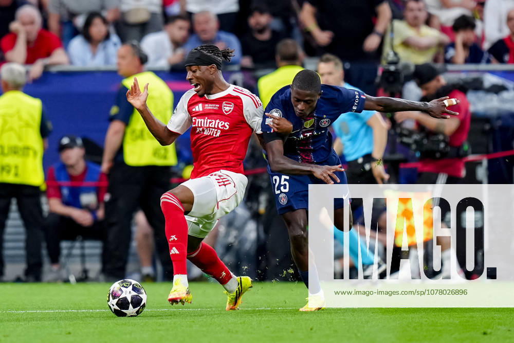 Paris Saint-Germain v Arsenal FC - UEFA Champions League Final 2026 Noni Madueke of Arsenal FC competes for the ball with Nuno Mendes of Paris Saint-Germain FC during the UEFA Champions League Final match between Paris Saint-Germain FC and Arsenal FC at Puskas Arena on May 30, 2026 in Budapest, Hungary Budapest Puskas Arena Hungary Hungary