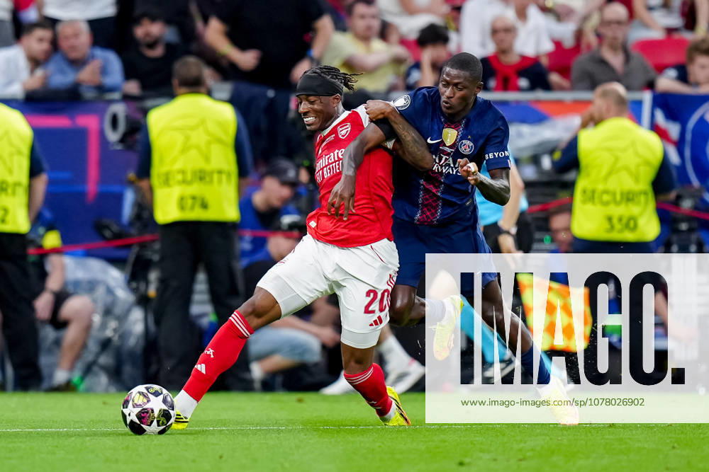 Paris Saint-Germain v Arsenal FC - UEFA Champions League Final 2026 Noni Madueke of Arsenal FC competes for the ball with Nuno Mendes of Paris Saint-Germain FC during the UEFA Champions League Final match between Paris Saint-Germain FC and Arsenal FC at Puskas Arena on May 30, 2026 in Budapest, Hungary Budapest Puskas Arena Hungary Hungary