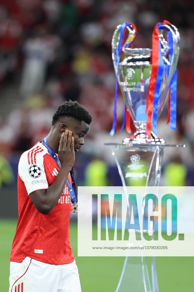 Paris Saint-Germain v Arsenal FC - UEFA Champions League Final 2026 Bukayo Saka of Arsenal looks dejected after the UEFA Champions League Final 2026 match between Paris Saint-Germain and Arsenal FC at Puskas Arena on May 30, 2026 in Budapest, Hungary. WARNING! This Photograph May Only Be Used For Newspaper And Or Magazine Editorial Purposes. May Not Be Used For Publications Involving 1 player, 1 Club Or 1 Competition Without Written Authorisation From Football DataCo Ltd. For Any Queries, Please Contact Football DataCo Ltd on +44 (0) 207 864 9121 Budapest Puskas Arena Hungary Hungary