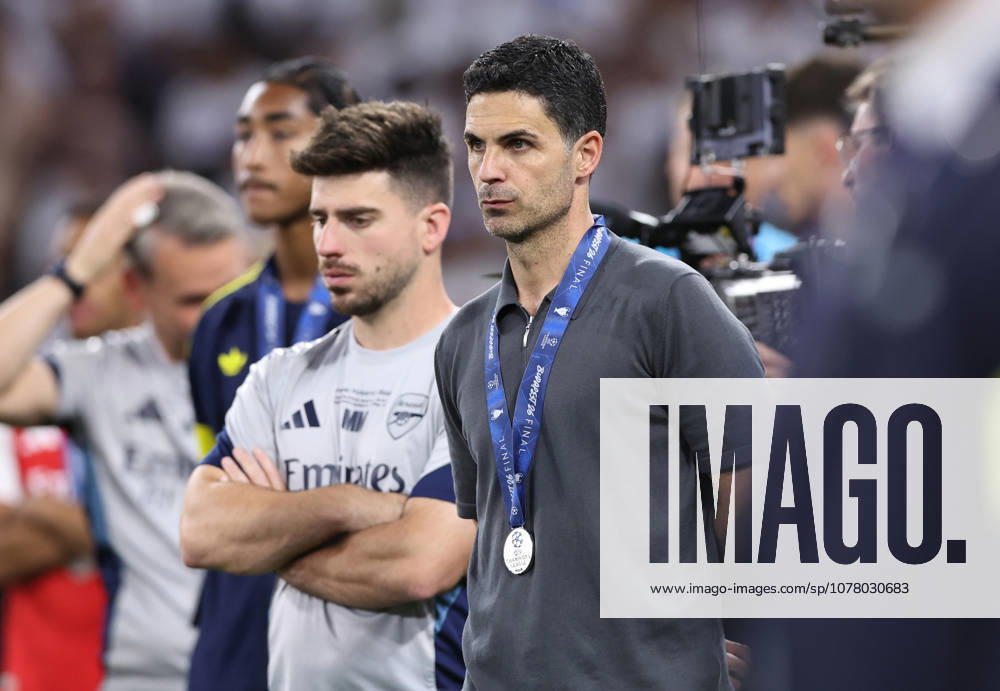 Budapest, Hungary, 30th May 2026. Mikel Arteta manager of Arsenal watches the PSG celebrations during the Paris Saint Germain vs Arsenal UEFA Champions League Final match at Puskas Arena, Budapest. Picture credit should read: David Klein Sportimage . SPI_154_DK_PSG_Arsenal SPI-4828-0153