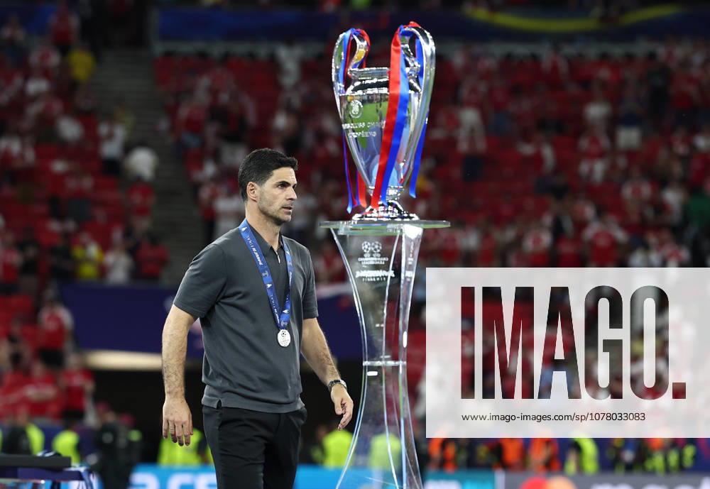 Budapest, Hungary, 30th May 2026. Mikel Arteta manager of Arsenal walks past the trophy during the Paris Saint Germain vs Arsenal UEFA Champions League Final match at Puskas Arena, Budapest. Picture credit should read: David Klein Sportimage . SPI_217_DK_PSG_Arsenal SPI-4828-0212