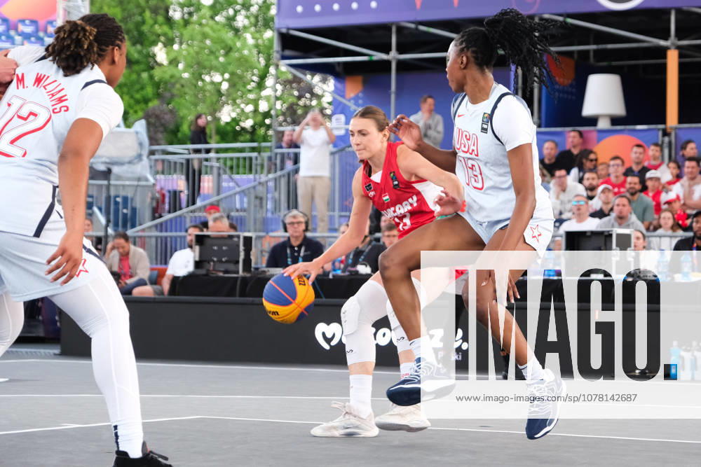 USA s MIKAYLAH WILLIAMS (12) and JOYCE EDWARDS (13) in action against Hungary s REKA LELIK (13) during a FIBA 3x3 Basketball World Cup women s Pool B game between the United States and Hungary in Warsaw, Poland. Warsaw Poland - ZUMAk204 20260602_zip_k204_001