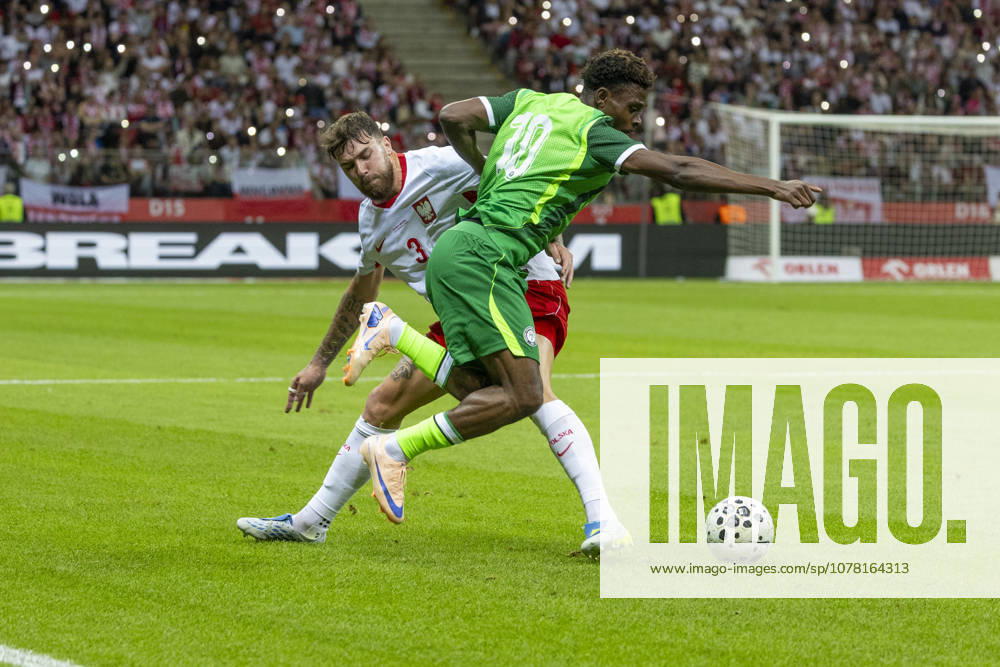 Poland - Nigeria 03.06.2026 football, Warsaw, PGE National Stadium, FIFA , friendly international game match Poland - Nigeria ( mecz towarzyski, pilka nozna, Polska - Nigeria ) image shows: Przemyslaw Wisniewski (L) Fisayo Dele-Bashiru (R) photo Katarzyna Plewczynska Fotostyk