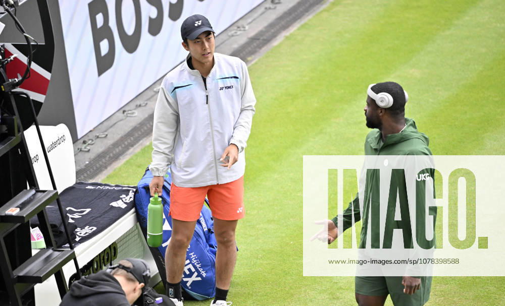 Frances Tiafoe USA in conversation Discussion with Rinky Hijikata AUS decide on rain break Tennis Men BOSS Open ATP 250 Stuttgart 2026 Weissenhof BOSS Open ATP 250 Stuttgart 2026