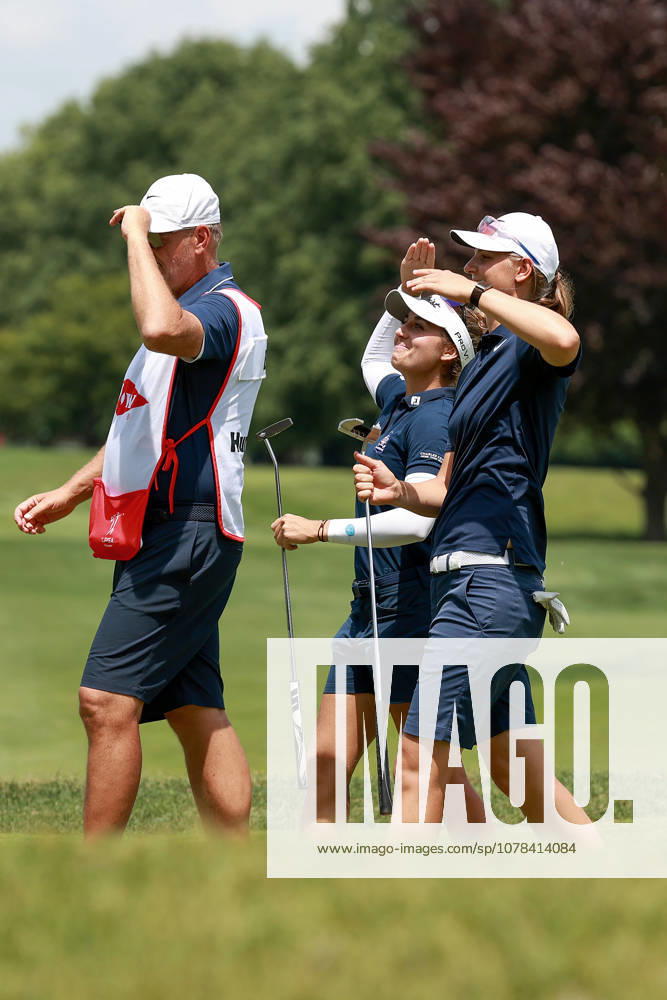 Dow Championship Midland, MI - JUNE 11: Rookie Nastasia Nadaud of France (center) celebrates with her teammate, rookie Helen Briem of Germany (far right) on the 16th green after completing the 16th hole during the first round of the Dow Championship at Midland Country Club on June 11, 2026 in Midland, Michigan. Midland Michigan United States
