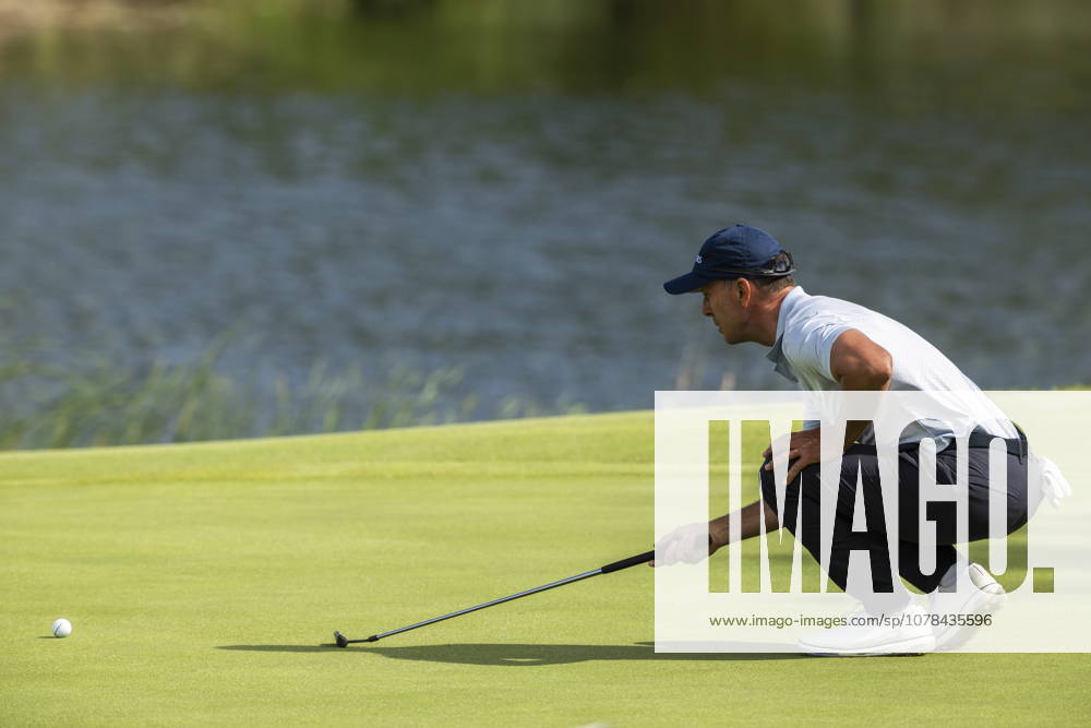 Mike Weir, of Sarnia, Ont., lines up a putt on the eighteenth hole during the second round of the RBC Canadian Open in Caledon, Ont., on Friday, June 12, 2026. Canada News - June 12, 2026 - ZUMAc35_ 20260612_zaf_c35_094